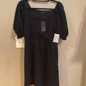 NWT Perfect condition, 19 Cooper Black Midi Dress with Short Sleeves.